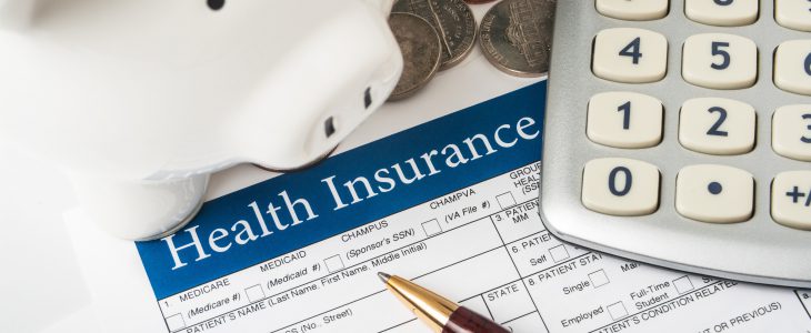 Health insurance form with piggy bank to increase health insurance literacy